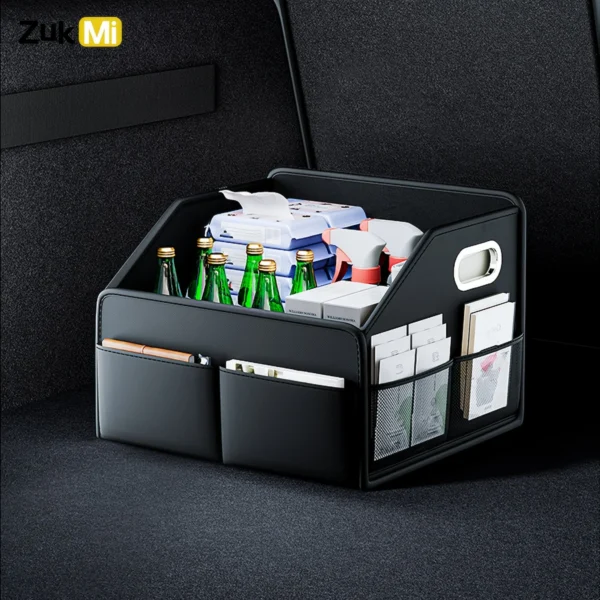 Black waterproof leather trunk organizer open in an SUV cargo area with groceries inside