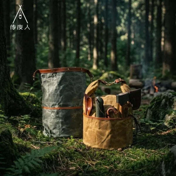 Green bushcraft canvas storage bag with roll-top closure, leather edges and brass hardware