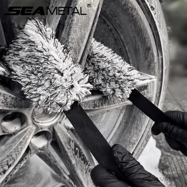 Car wheel wash towel in microfiber with a double-sided long strap pulled through a wheel rim