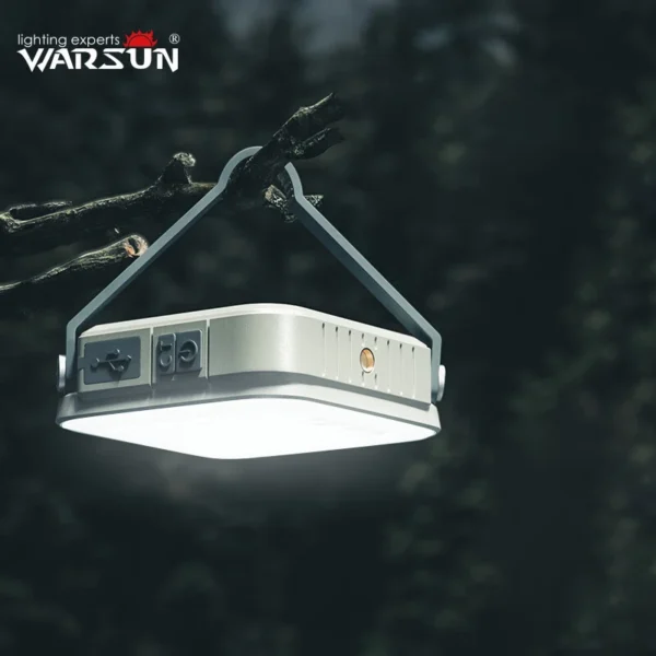 Warsun rechargeable hanging lantern glowing warm white from the ceiling of a camping tent