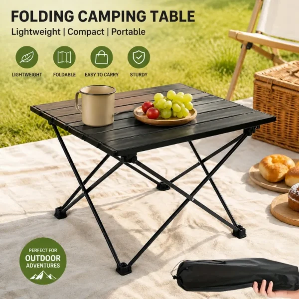Egg roll camping table with slatted top and X-shaped metal legs set on grass beside its bag