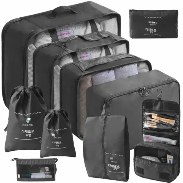 Foldable suitcase organizer set in grey with multiple packing cubes and shoe pouches laid out