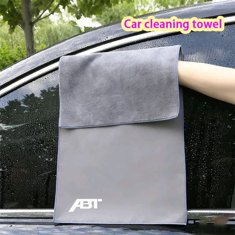 Lint Free Microfiber Towel Soft Absorbent Car Cleaning Cloth 1 Lint free microfiber towel folded on a clean car dashboard next to the windshield