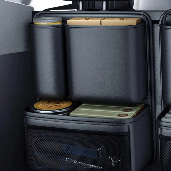 Seat back hanging organizer with multiple compartments attached to a car rear seat