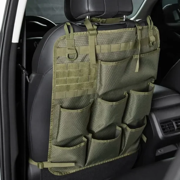 Tactical seat back organizer in camouflage Oxford cloth hanging behind a car front seat