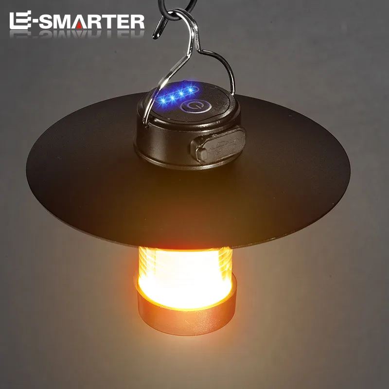 Magnetic Tent Light, 600 Lumen Type-C Rechargeable LED 1 Magnetic tent light stuck to the side of a car lighting up a campsite at night