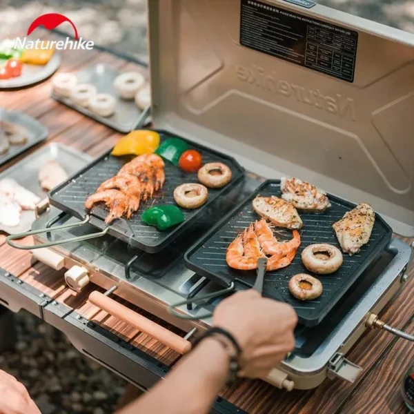 Naturehike folding camping frying pan cooking eggs on a portable stove at a campsite