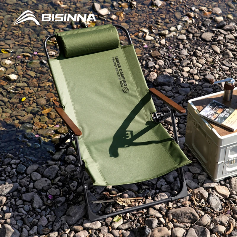 Folding Camping Lounge Chair with Armrests and Oxford Seat 1 BISINNA folding camping lounge chair in green with armrests set up at a campsite