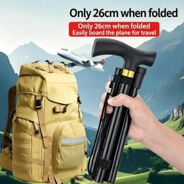 Foldable aluminum hiking stick in red with T-shaped handle, wrist strap and rubber tip