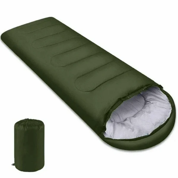 Envelope camping sleeping bag in green laid out in a tent with the hood open