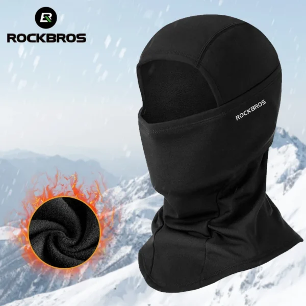 Windproof winter balaclava in black knit polyester worn as a full face mask under a helmet