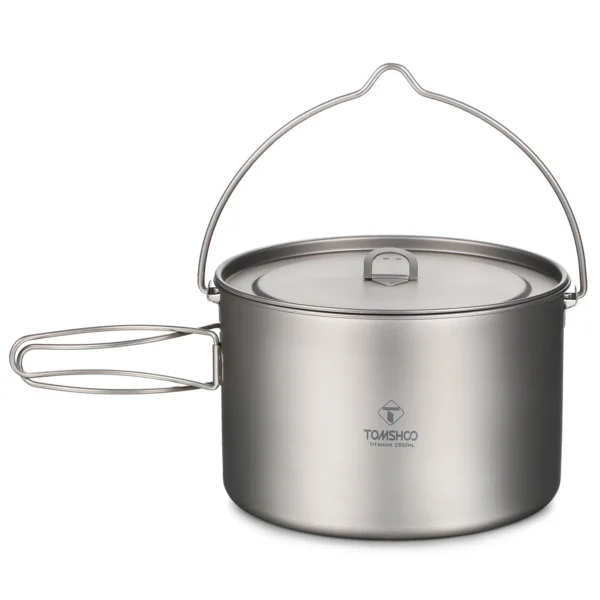 Titanium hanging pot with lid and folded handles beside its mesh storage bag