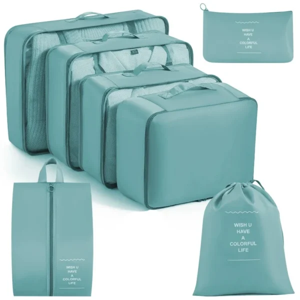 Waterproof luggage organizer bags in pink, seven rectangular pieces of different sizes stacked together