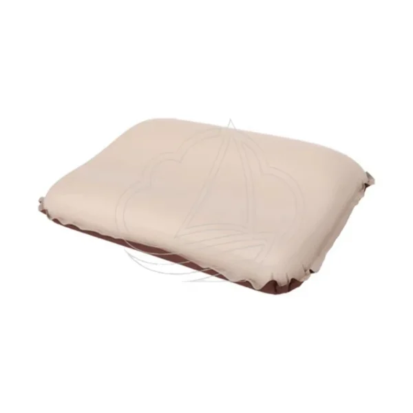 Ergonomic self inflating pillow with 3D contoured shape on a camping sleeping pad