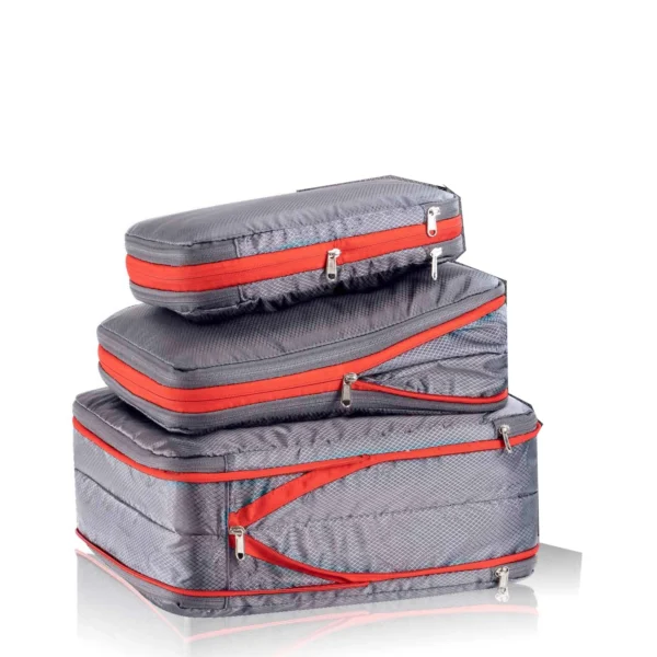 Gray ripstop compression packing cubes in three sizes with compression zippers closed