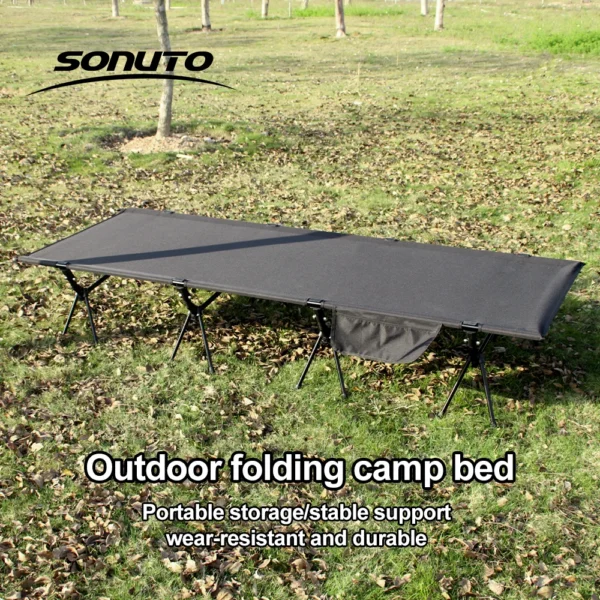 Folding camping bed in army green with 600D Oxford fabric set up inside a large tent