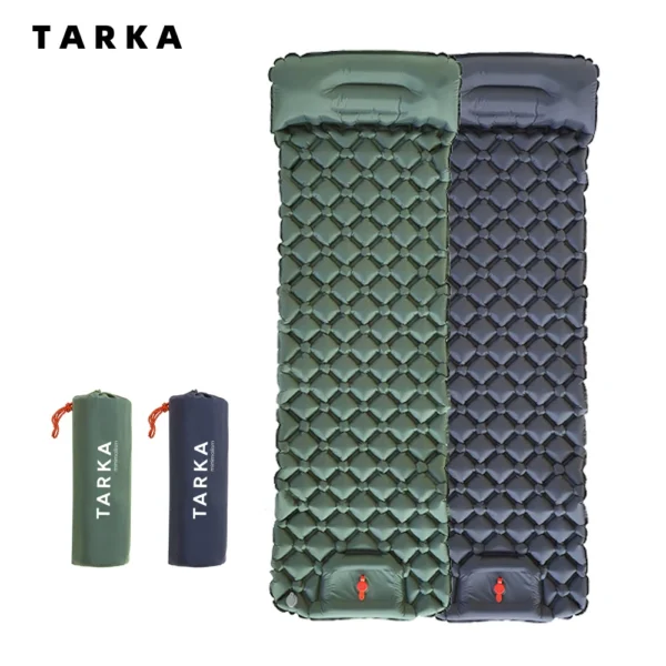 Two connectable camping air mattresses in army green joined into a double bed inside a tent