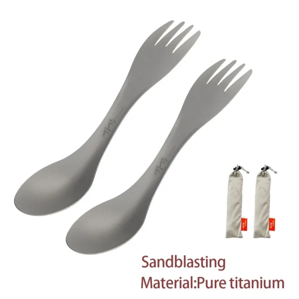 Titanium spork set of two ultralight spoon and fork utensils on a camp table