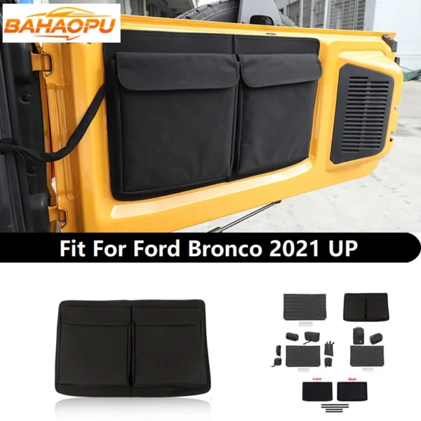 Black multi-pocket tailgate cargo organizer installed on the inside of a Ford Bronco tailgate