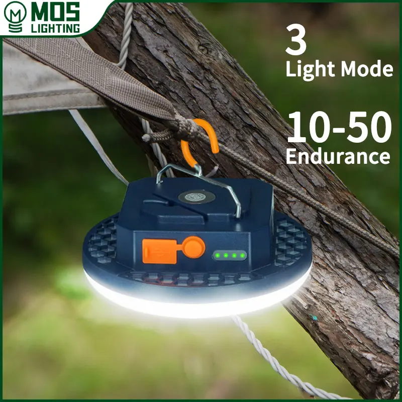 Dual Color Camping Lantern Rechargeable LED with Phone Charging 1 Dual color camping lantern glowing warm yellow on a camp table beside a tent at night