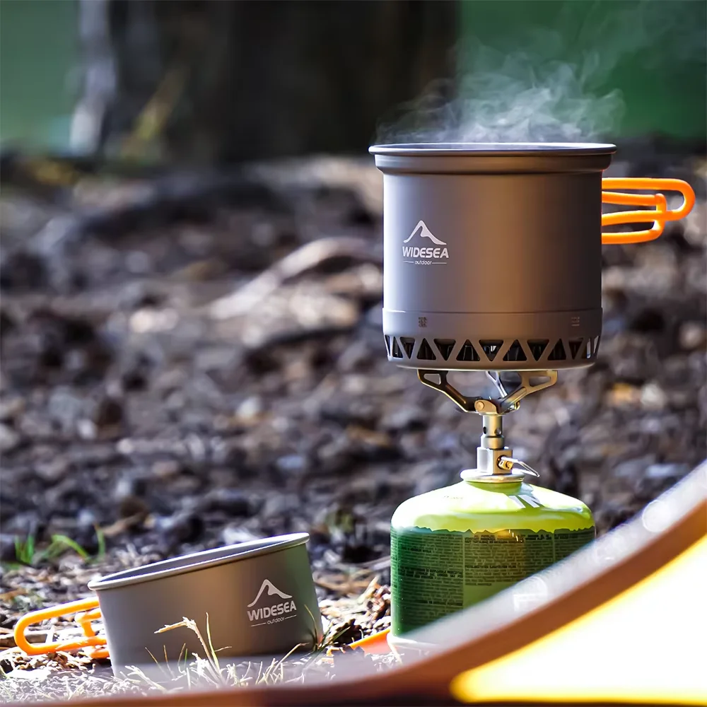 Nesting Camping Pot Set, 1.3L and 2.3L Hard Anodized Aluminum 1 Nesting camping pot set in hard anodized aluminum with orange folding handles beside its bag