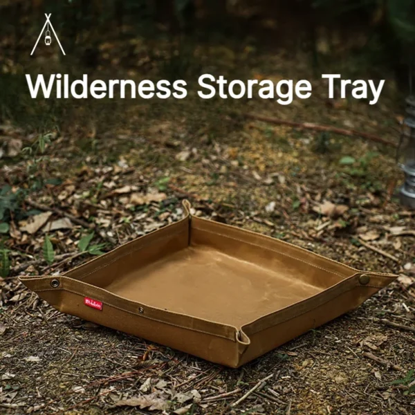 Khaki waxed canvas valet tray snapped into tray shape holding a knife, fire steel and camp utensils
