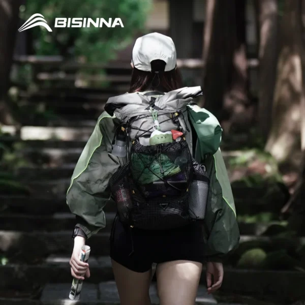 Expandable hiking backpack with 10L top extension opened above the 25L main body