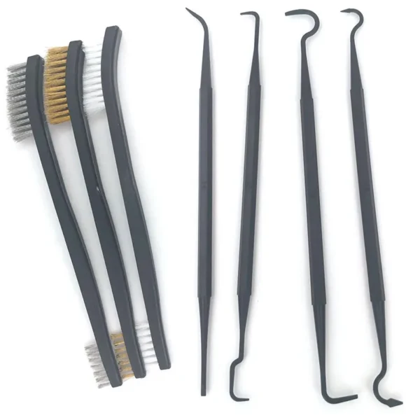 Wire brush pick set with wire brushes and nylon picks laid out on a workbench