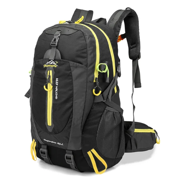 Water resistant hiking daypack in orange with side mesh pockets and trekking pole straps