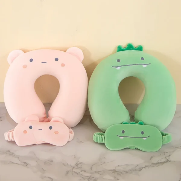 Eye mask neck pillow in a cartoon design resting on a car seat