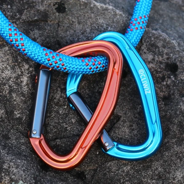Blue UIAA climbing carabiner with curved D gate made of 7075 aluminum shown against a white background