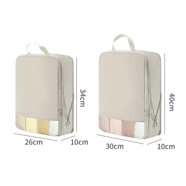 2 piece packing cubes in soft grey polyester packed with clothes in an open suitcase