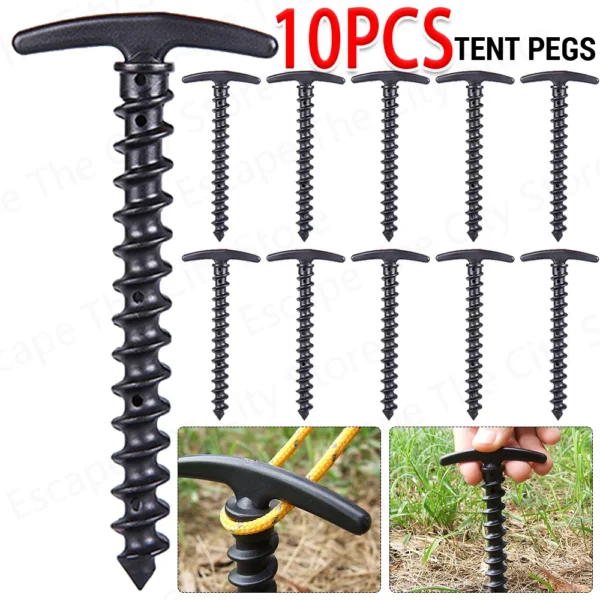 Plastic screw tent pegs pushed into grass holding guy lines of a canopy tent