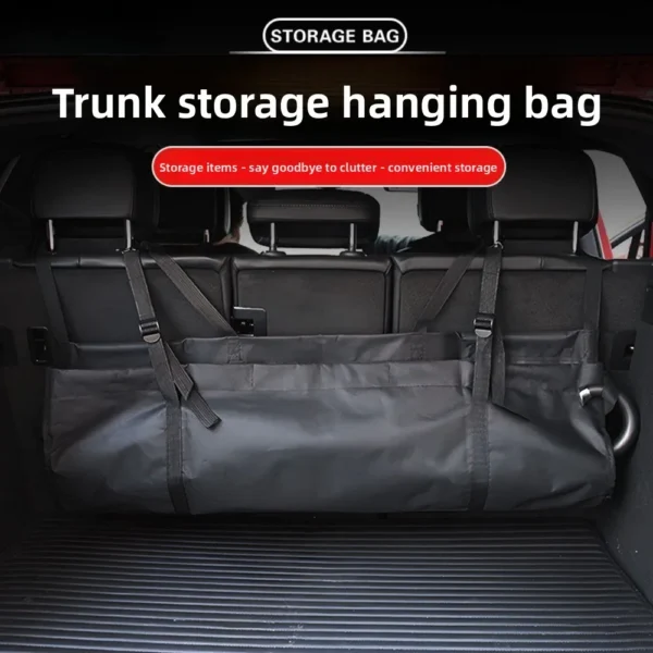 Black Oxford trunk hanging bag with umbrella and tools inside a car trunk