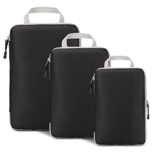 Navy blue compressible foldable packing cubes in three sizes with carry handles