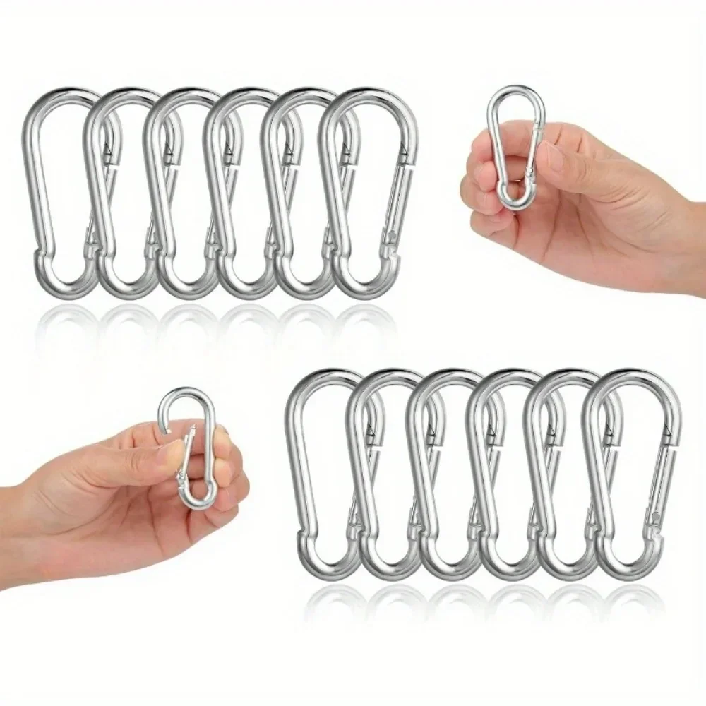 Stainless Steel Carabiner Set 12 Pack 6x60mm with 180kg Rating 1 Stainless steel carabiner set of twelve 6x60mm silver clips laid out in rows