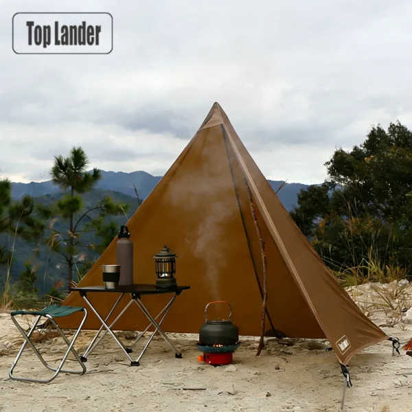 Brown ultralight stove wind screen set up with trekking poles around a camp stove on a hillside