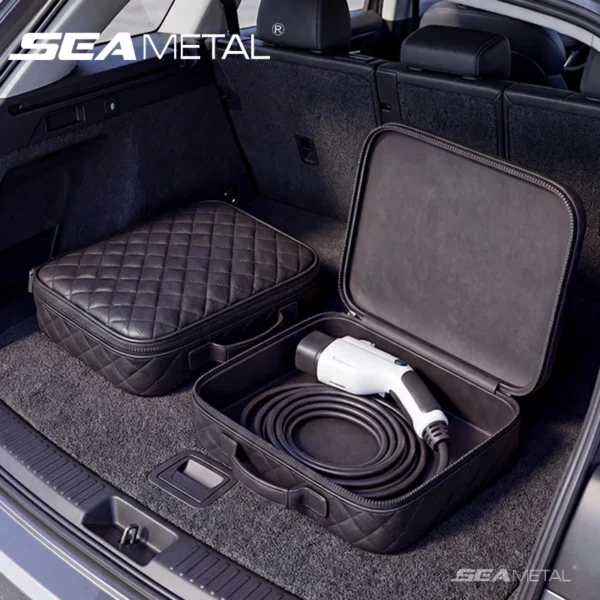 Black ev charger cable bag in waterproof PU with a coiled charging cable inside, in a car trunk