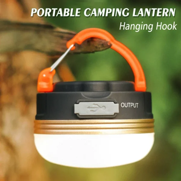Mini magnetic camping lamp attached to a metal surface with its snap-on hook and frosted shade