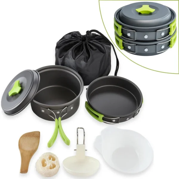 Nonstick camping mess kit with anodized pot, pan, bowls and spoons beside its drawstring pouch