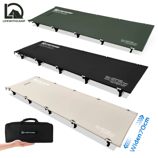 Black compact folding camping cot 70 cm wide with oxford fabric surface set up inside a tent