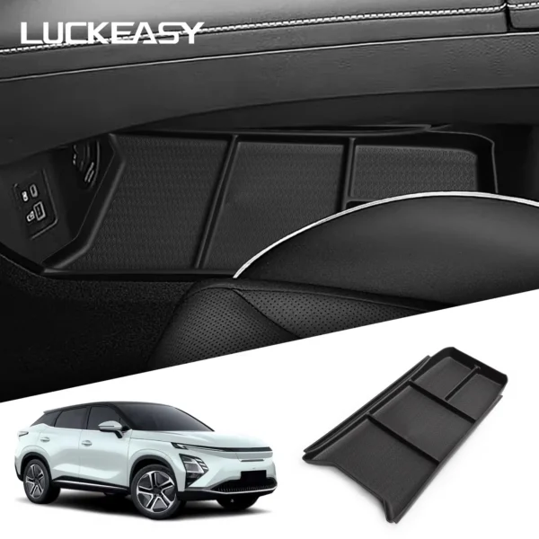 Black TPE lower console storage box placed in the center console lower shelf of a Chery OMODA C5 EV