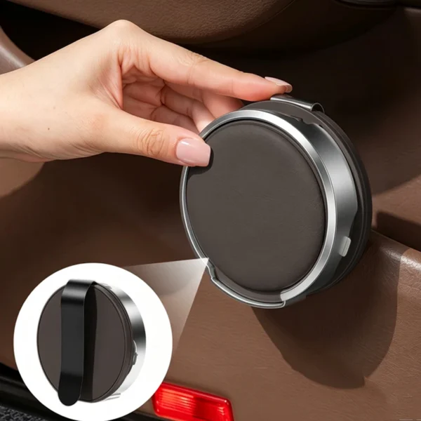 Leather car door cup holder in brown holding a drink bottle beside a car seat