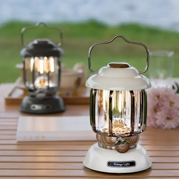 Dimmable vintage lantern in black iron with warm white LED filaments glowing inside