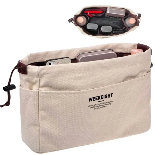 Beige white canvas purse organizer insert holding wallet, keys and phone
