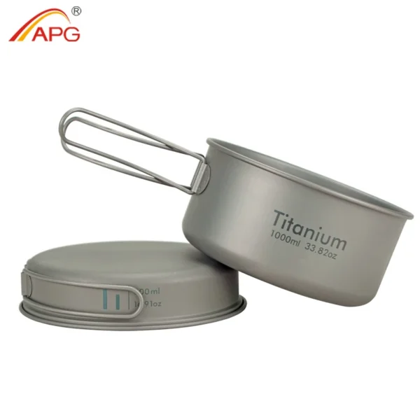 Folding handle titanium pan set with saucepot and flipped lid used as a plate on a rock