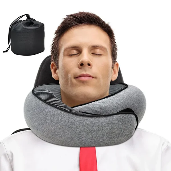 U-shaped memory foam neck pillow in light gray with a soft cotton cover on a car seat