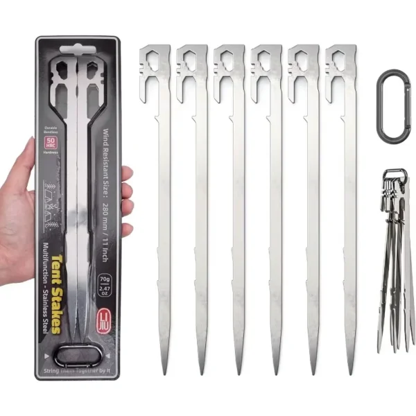 Heavy duty ground stakes in stainless steel securing a tent corner on a grassy campsite