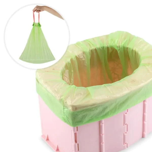 Portable toilet commode folded open and ready for use at a campsite
