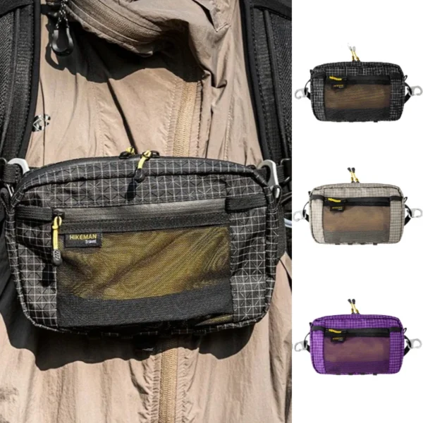 Ultralight hiking waist pack in black nylon with multiple zip pockets shown from the front